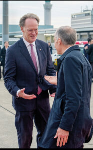 Ambassador Ian Mckay greets Prime Minister Mark Carney